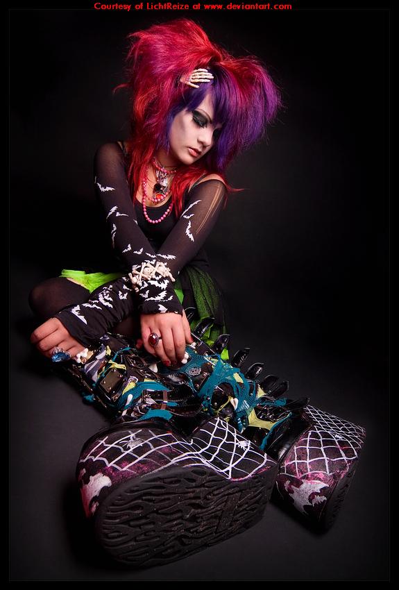 Cyber Goth girl with colorful hair. Typically, Cyber Goths incorporate color 